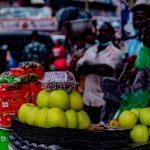 green apples on black plastic basket