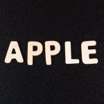 the word apple spelled with white letters on a black background