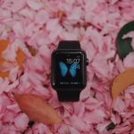 space black aluminum case Apple Watch with black Sport Band on pink petals