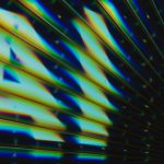 "a.n. is gleaming in colorful, diagonal lines."