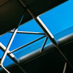 white metal frame under blue sky during daytime