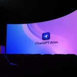 Large screen displaying "chatgpt atlas" logo