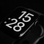 a close up of a black and white apple watch