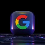 a close up of a computer keyboard with a google logo on it