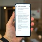 person holding black iphone 7