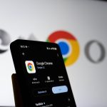 Smartphone displaying google chrome app with logo background