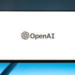 a computer screen with the open ai logo on it