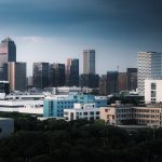 a view of a city with tall buildings