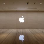 An image of an apple logo on a wall