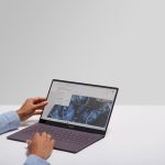 person using black laptop computer