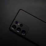 black remote control on black textile