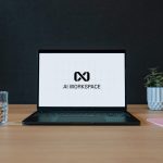Laptop with ai workspace logo on screen
