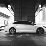 a white car parked in a parking lot