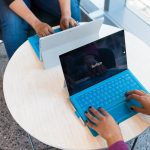 two person using Microsoft Surface