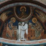 Fresco painting of an angel and religious figures