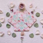 pink and white floral print paper on white surface
