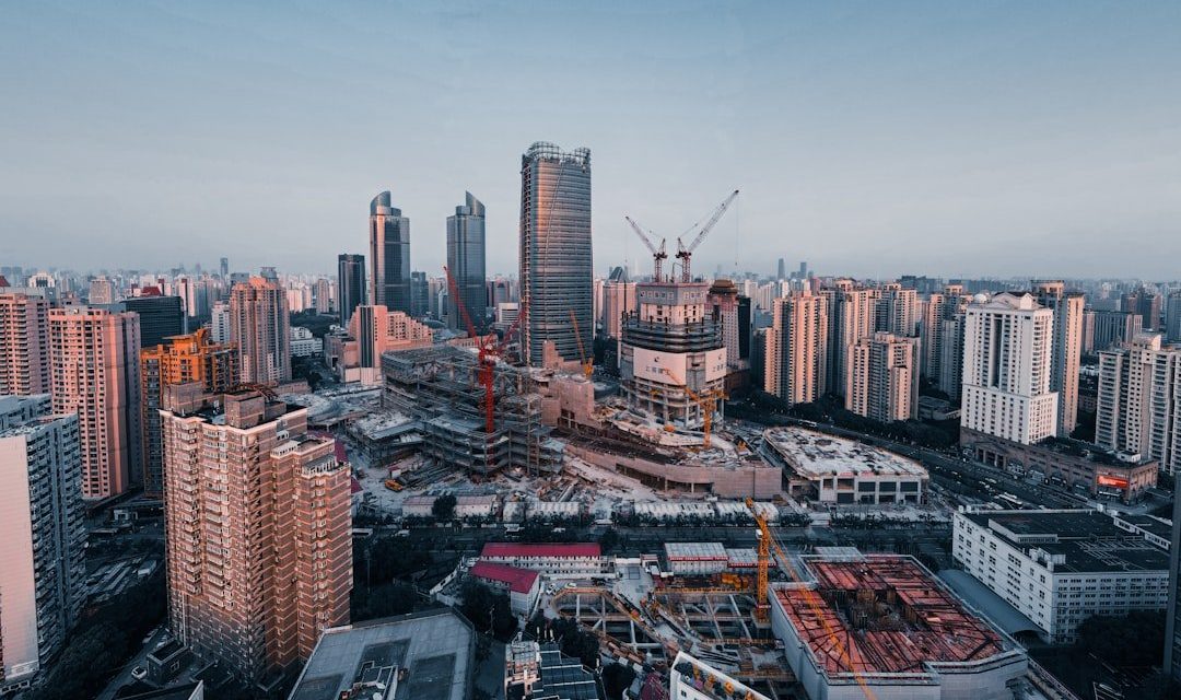 city skyline under blue sky during daytime