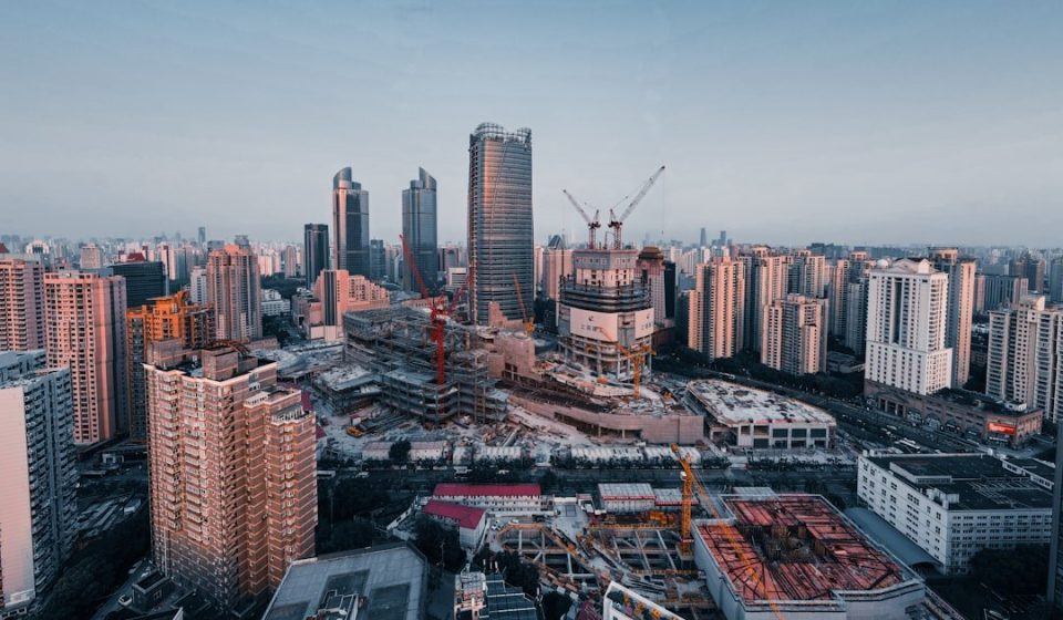 city skyline under blue sky during daytime