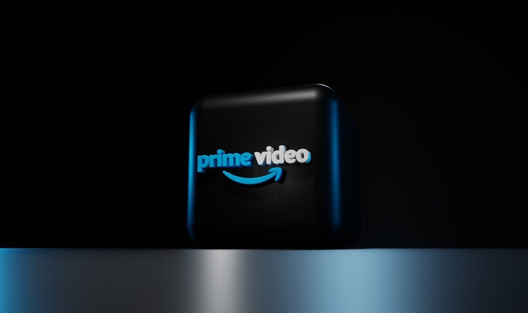 a blue logo on a black background