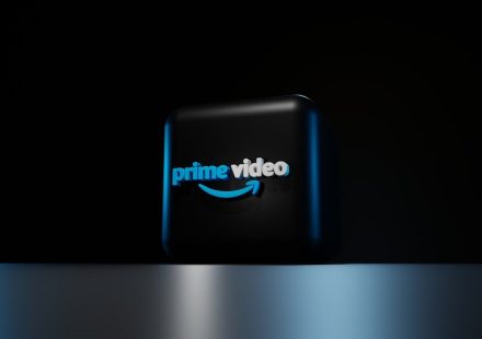 a blue logo on a black background