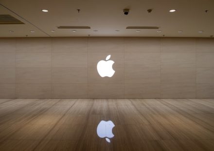 An image of an apple logo on a wall
