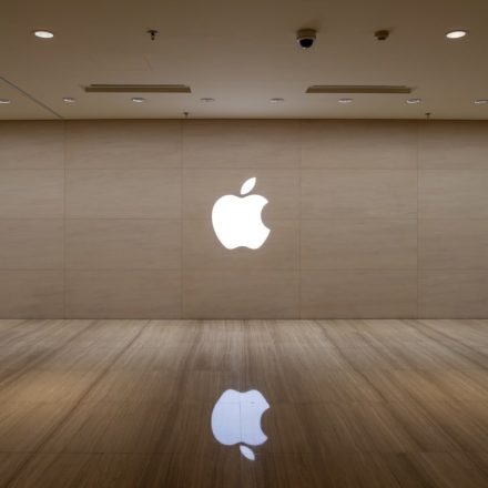 An image of an apple logo on a wall