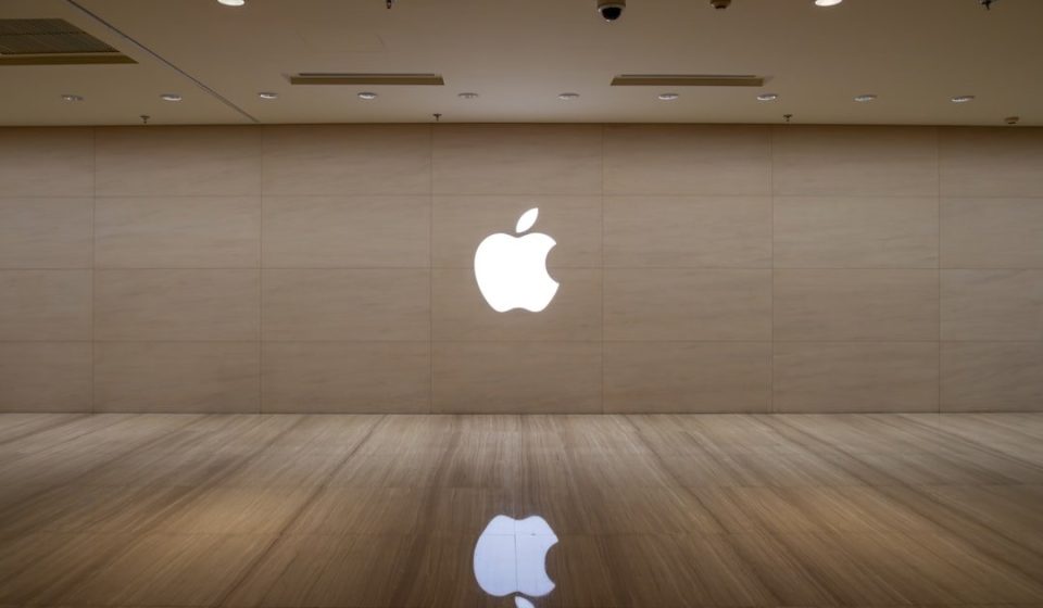 An image of an apple logo on a wall