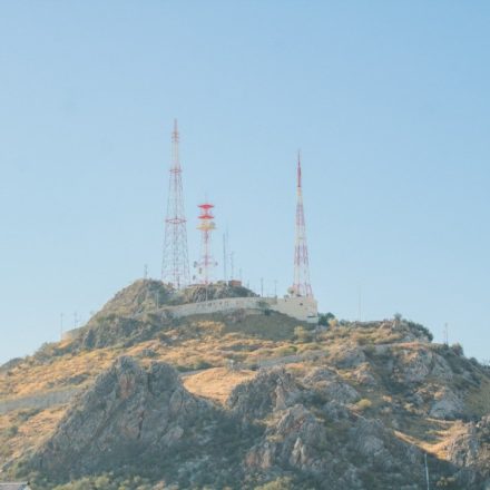 a group of towers on a hill