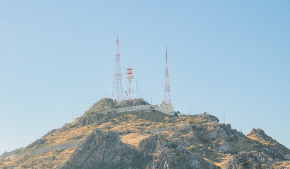 a group of towers on a hill
