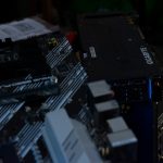 A computer motherboard and graphics card.