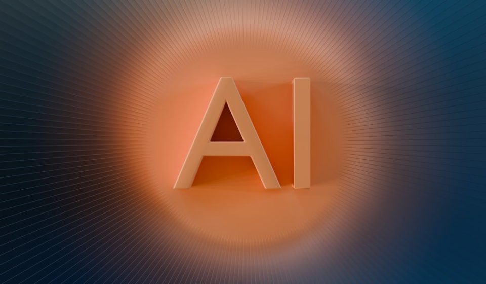 The letters ai glow with orange light.