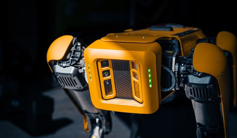 a close up of a robot that is yellow