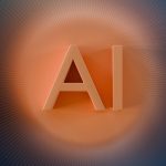 The letters ai glow with orange light.