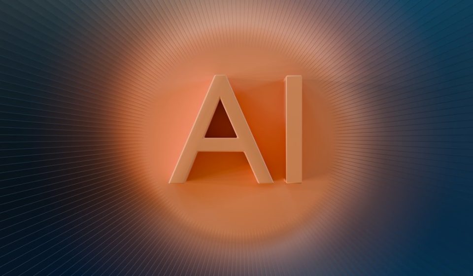 The letters ai glow with orange light.