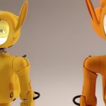 Two robots with glowing faces and cat-like ears.