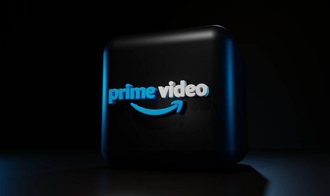 a blue logo on a black background
