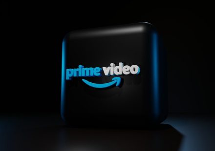 a blue logo on a black background