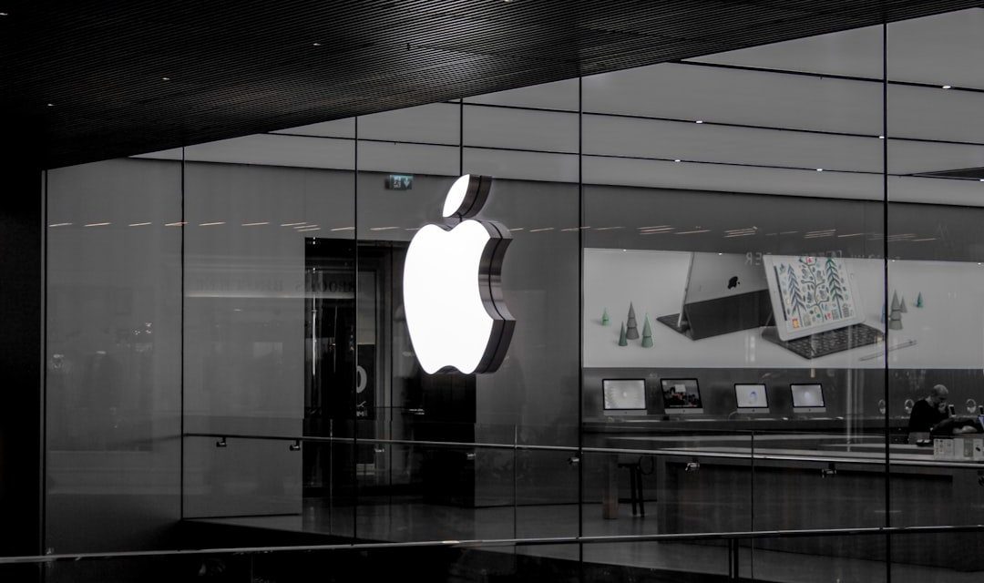 grayscale photo of Apple emblem