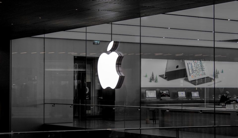 grayscale photo of Apple emblem