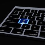 a close up of a keyboard on a black surface