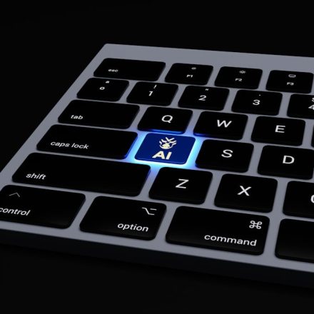 a close up of a keyboard on a black surface