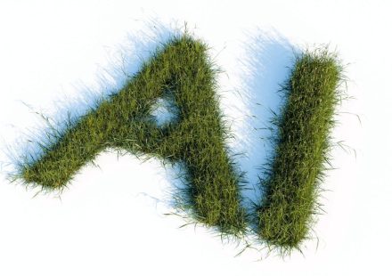 The letters ai made of green grass