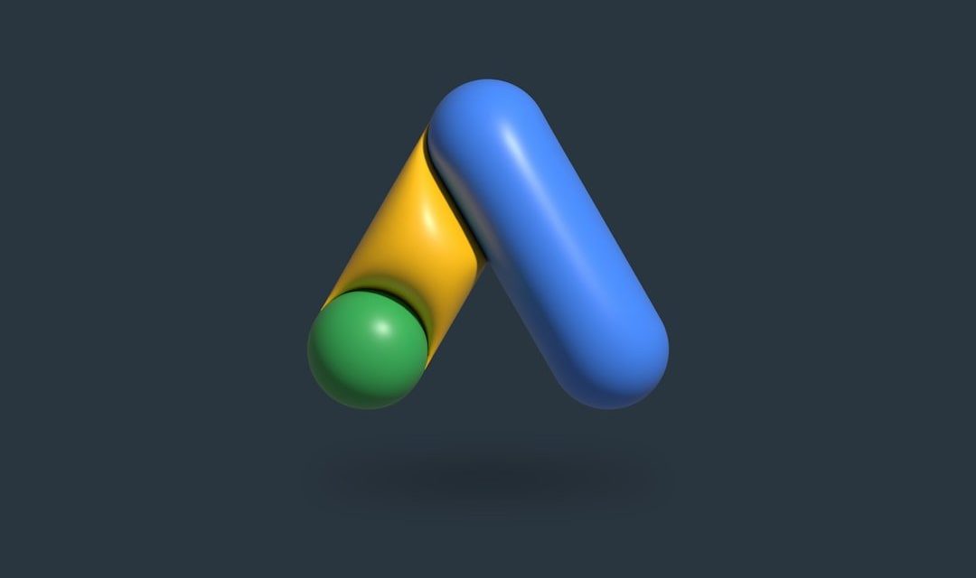 a blue and yellow object on a dark background