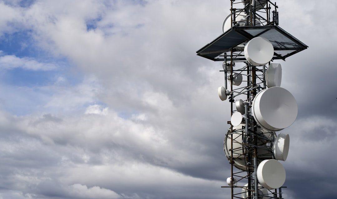 a satellite dish on a pole
