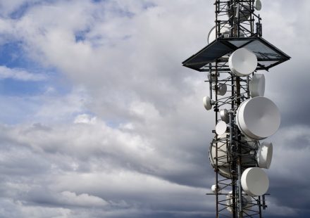a satellite dish on a pole