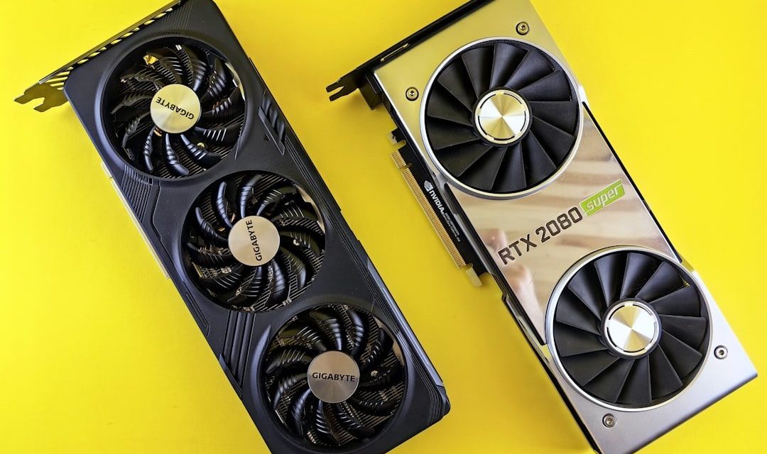 a close up of two computer fans on a yellow surface
