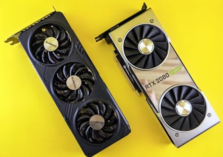 a close up of two computer fans on a yellow surface