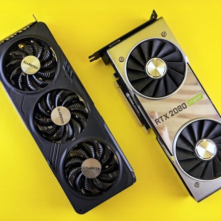 a close up of two computer fans on a yellow surface