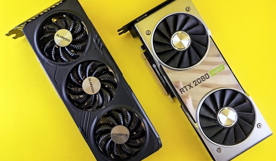 a close up of two computer fans on a yellow surface