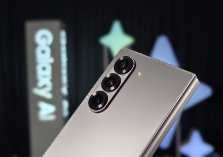 A close up of a silver cell phone